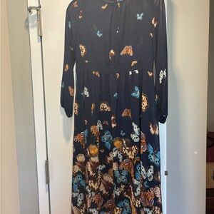 Beautiful butterfly dress new with tags.